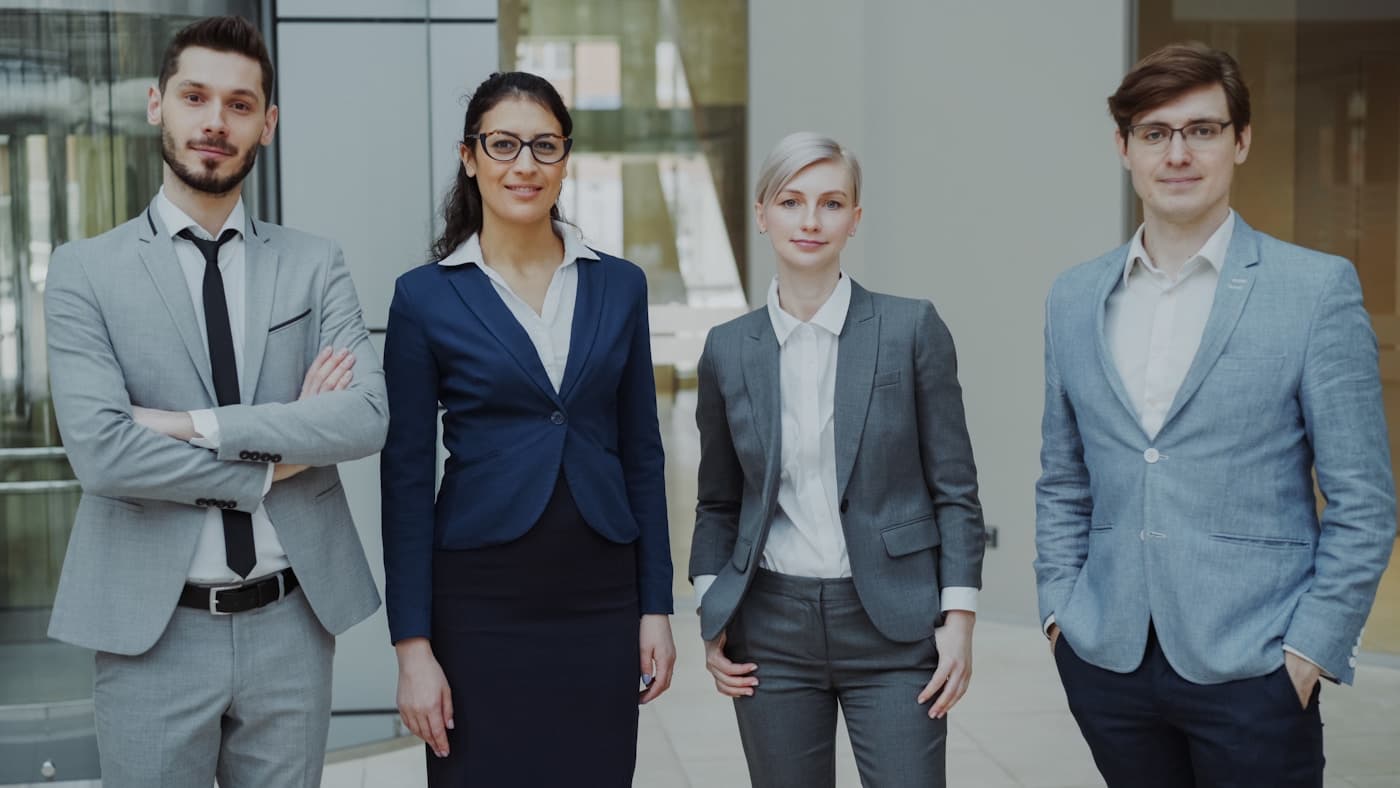 An Australian business team in a modern office — representing the kind of senior, APP and Privacy Act 1988-aligned AI delivery Aiinfox runs with Sydney, Melbourne, Brisbane and Perth clients.