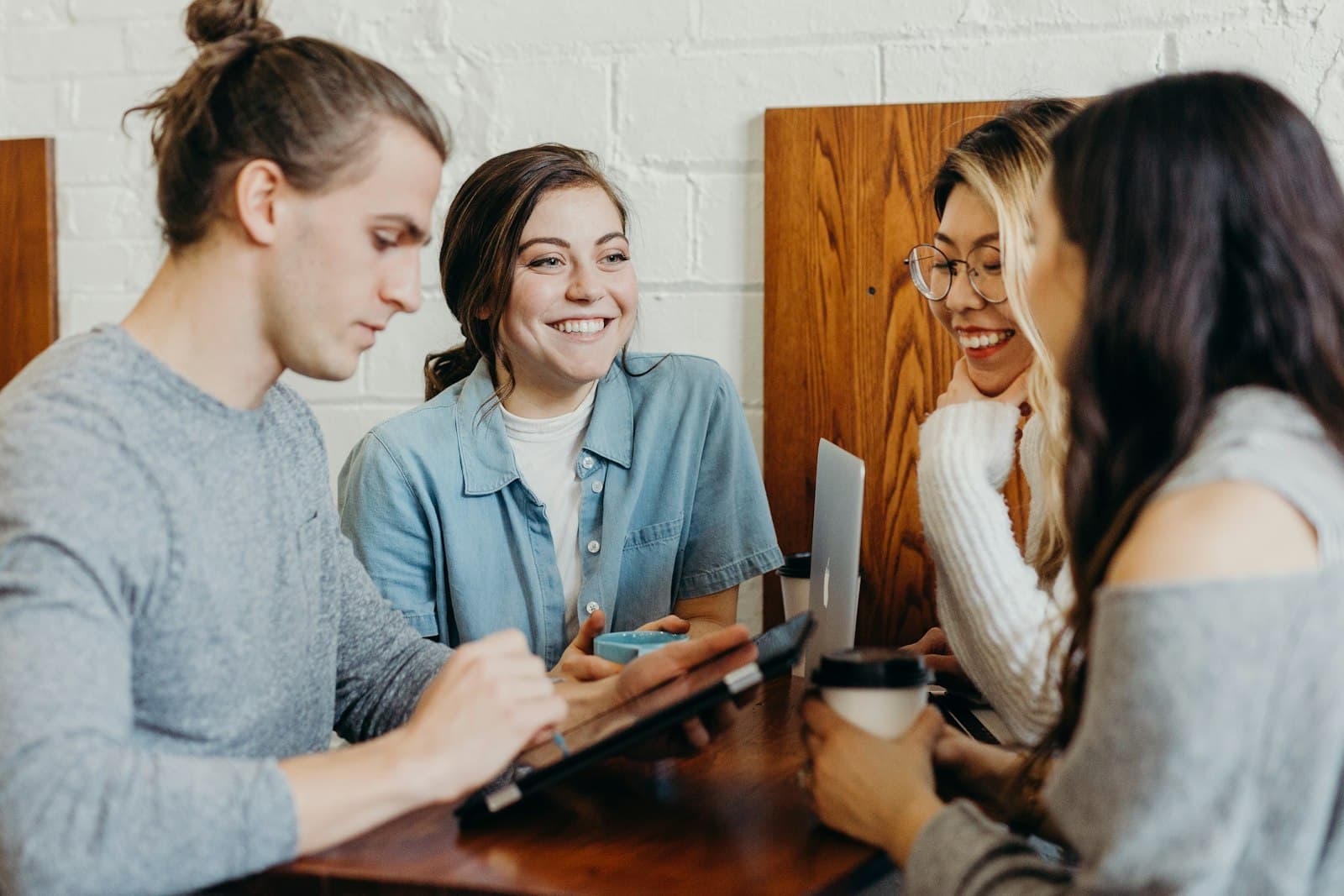 A Toronto product team collaborating in a working session — Aiinfox's senior Canadian delivery for Bay Street financial services, MaRS scaleups, and GTA healthcare.