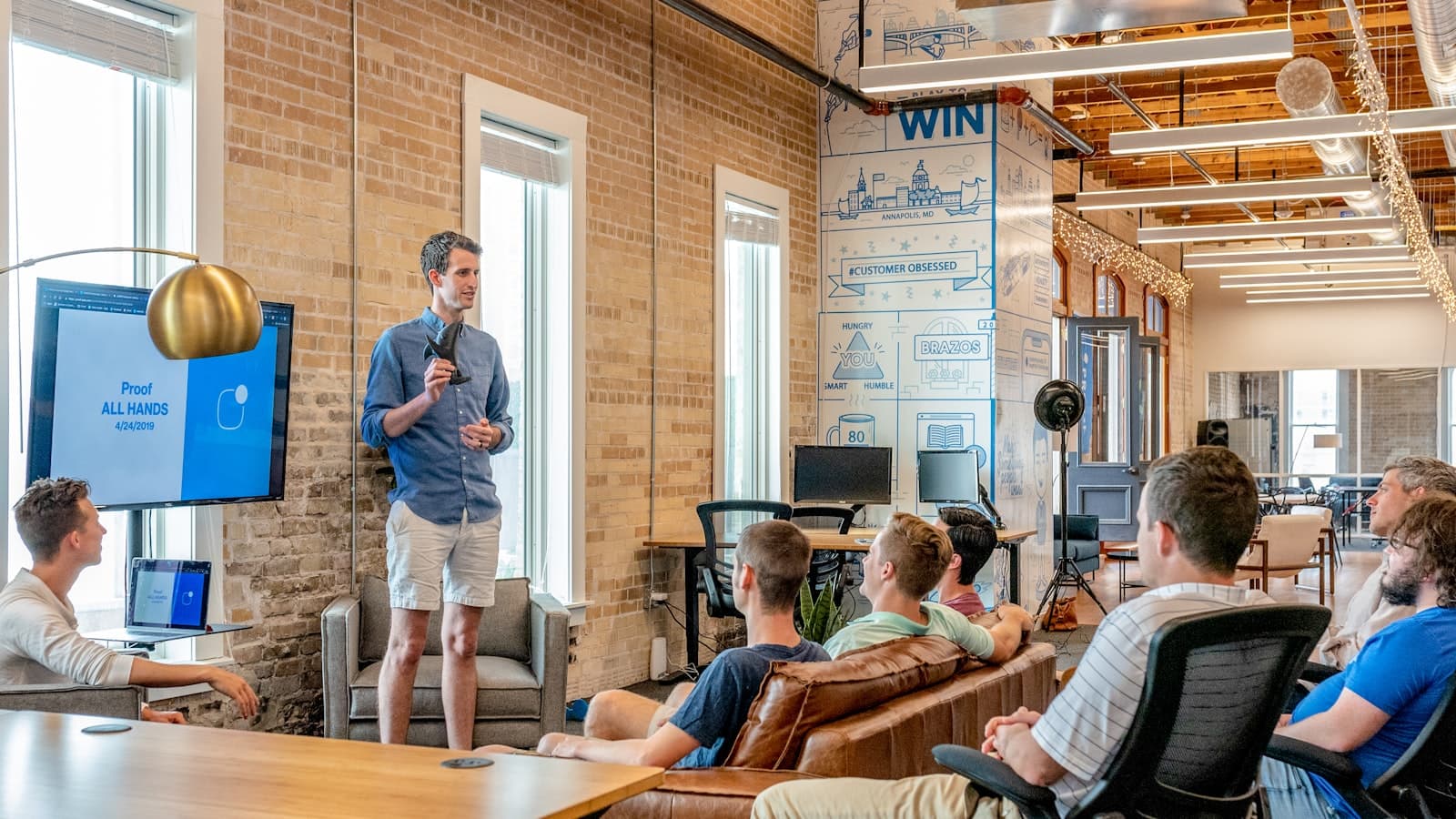 An Austin engineering team collaborating in a modern Texas office — Aiinfox's senior US delivery for ATX SaaS, fintech, and govtech with native Central Time overlap.